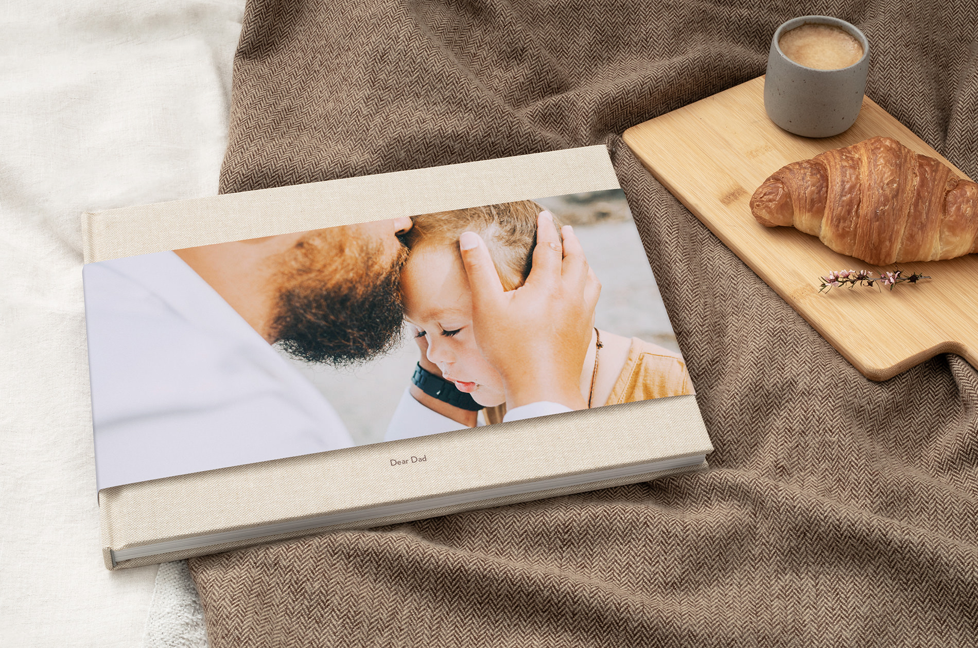 Parent with child on photo book