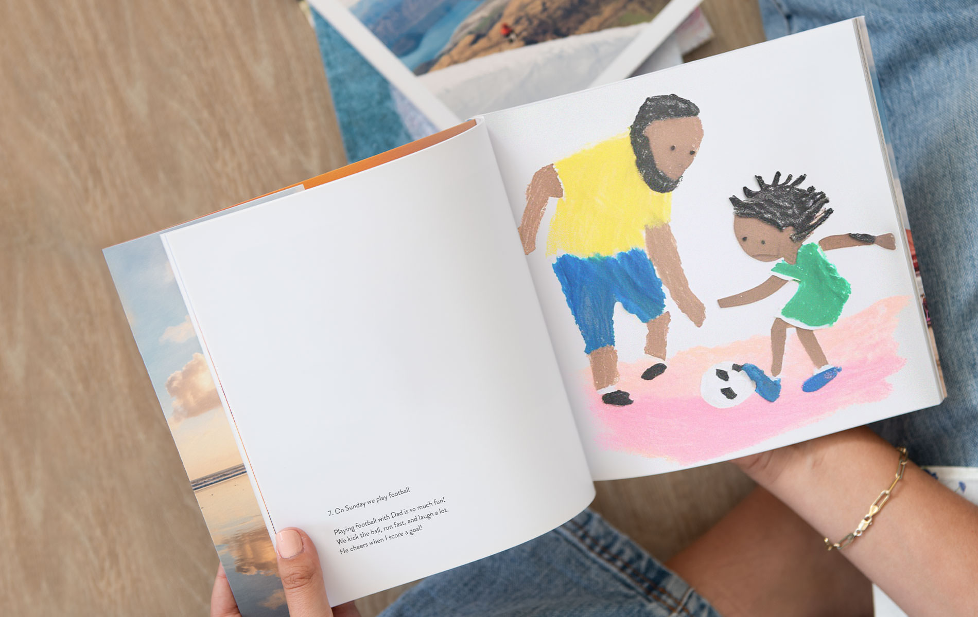 Softcover photo book of a childs art of them and their dad playing football