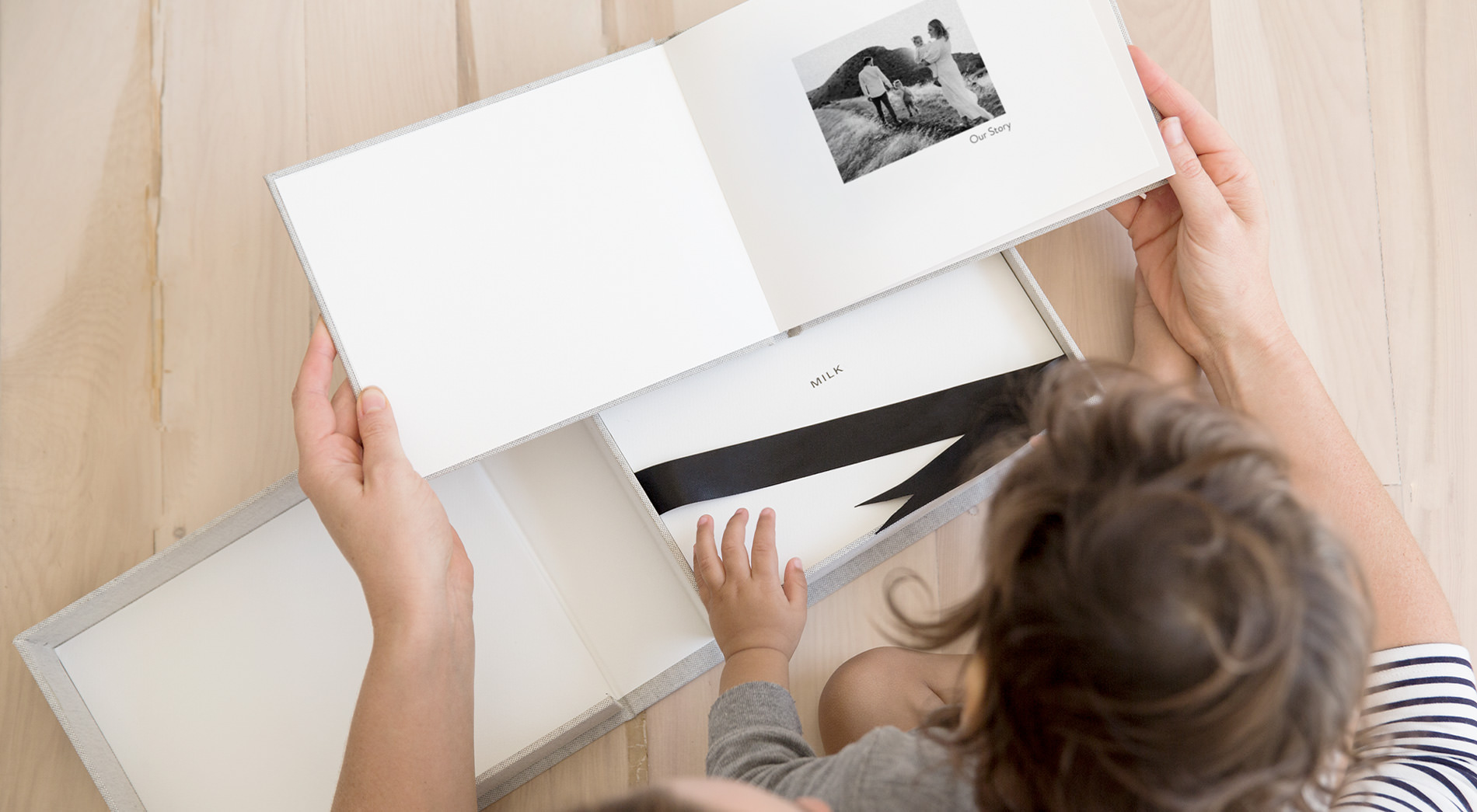 Young child and photo book