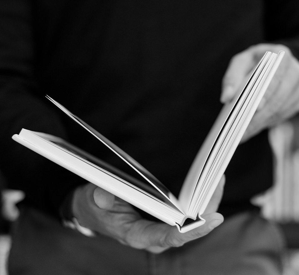 Man holding photo book