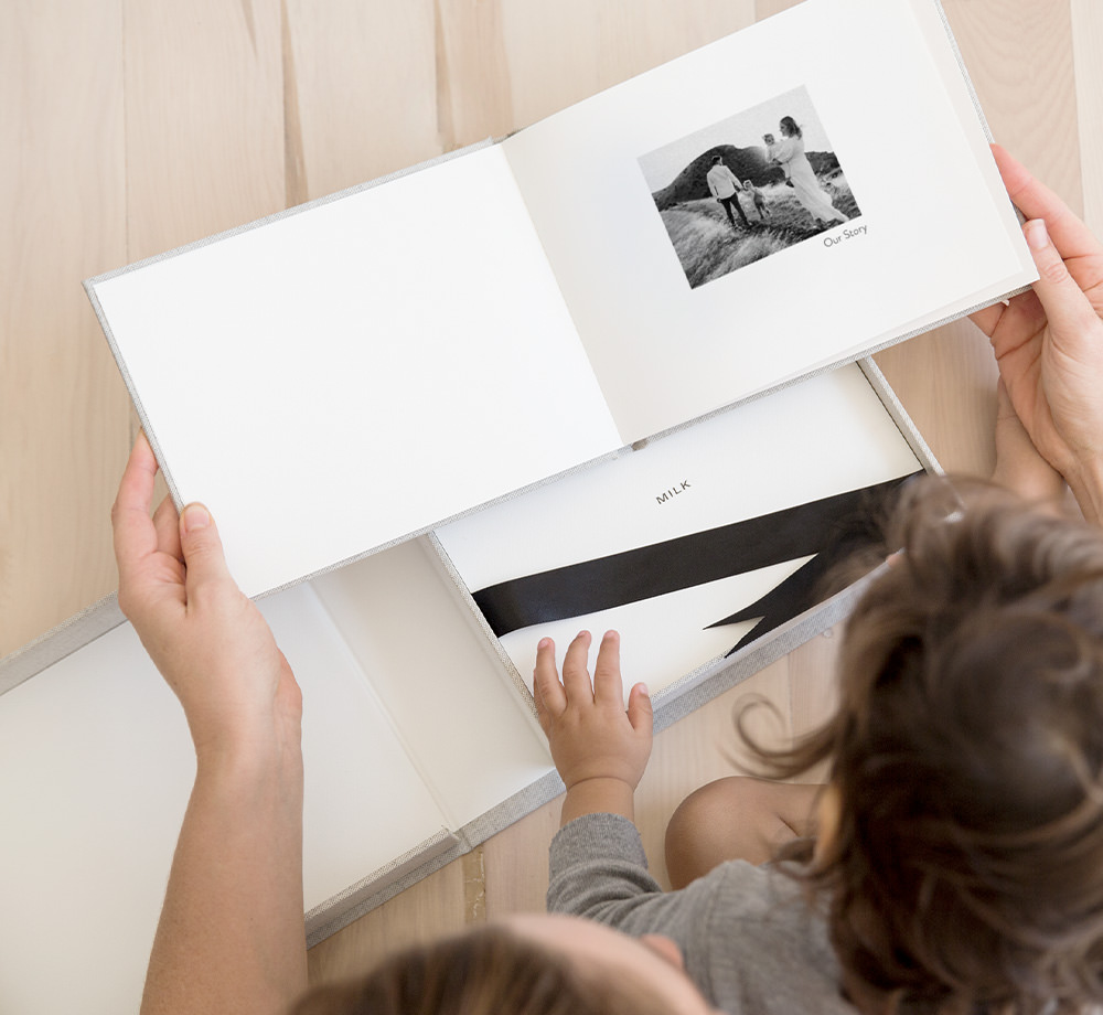 Young child and photo book