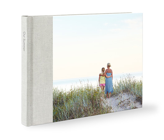Premium linen family landscape photo book with a mother and daughter on the cover.