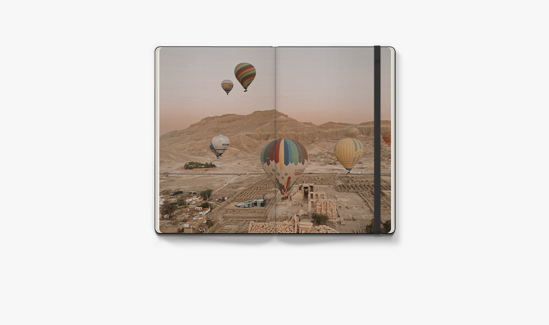 Portrait Moleskine Photo Book with hot air balloon travel photos inside