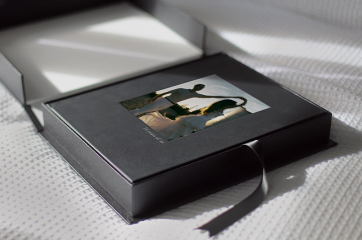 Photo Album in a presentation box on a bed