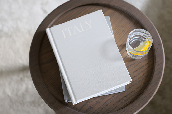 Medium Portrait Photo Album laying on a coffee table