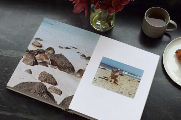 Open photo album with scanned printed images