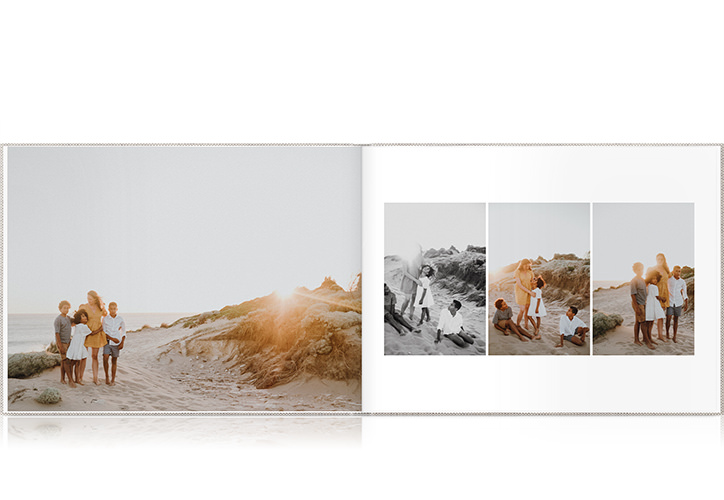 Double page spread of family at the beach.