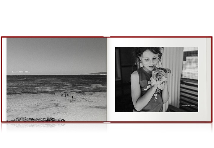 Open Red Landscape Premium Photo Book of a child holding a chicken at the beach