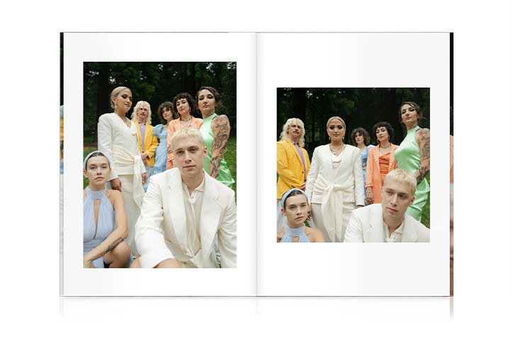 Wedding bridal party in pastel outfits all looking towards camera with blank stares