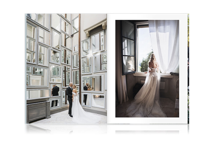 Open Wedding Magazine with bride and groom standing in front of wall covered in white framed mirrors