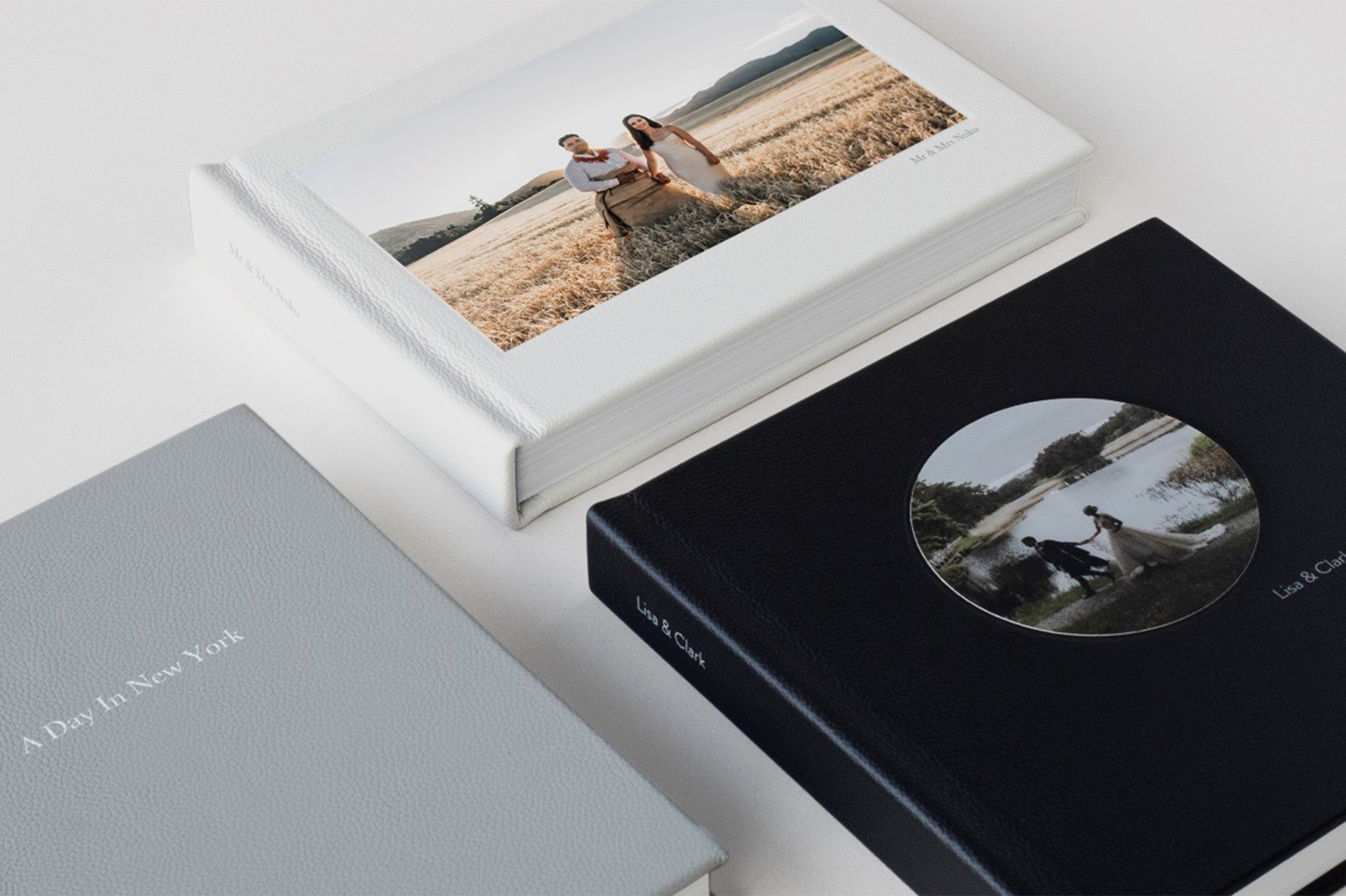 Leather photo books in various sizes with different cover designs