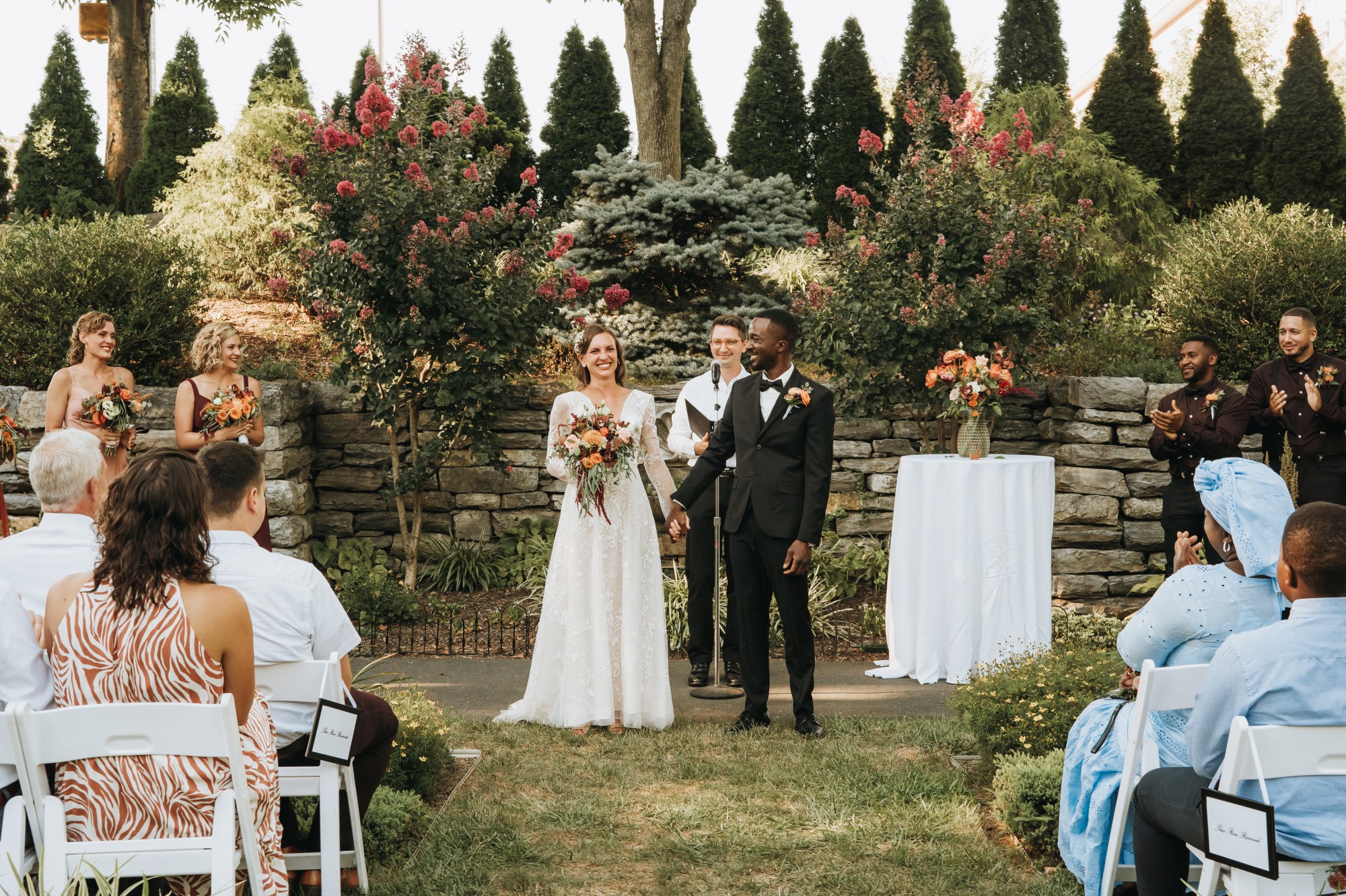 Wedding couple at ceremony aisle