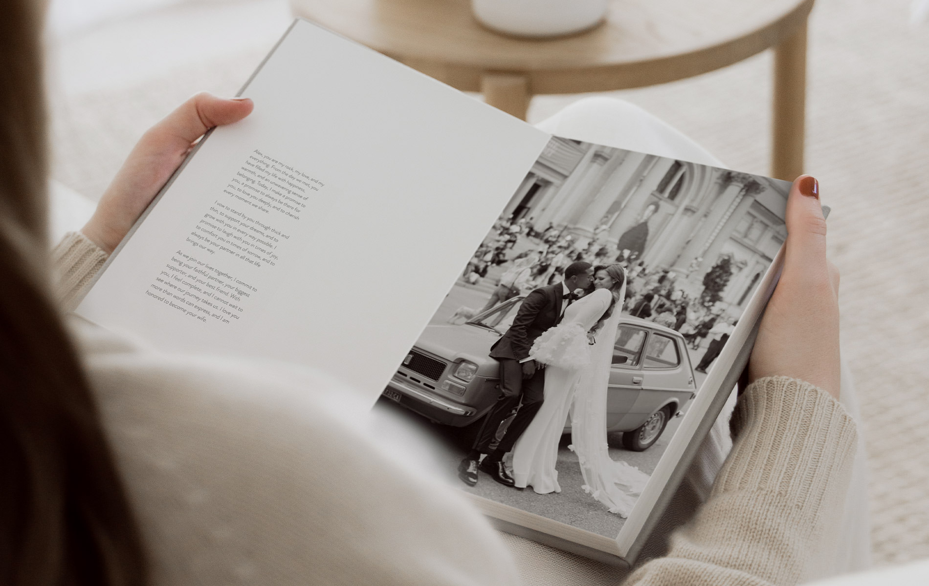 Open wedding album with vows on the left page