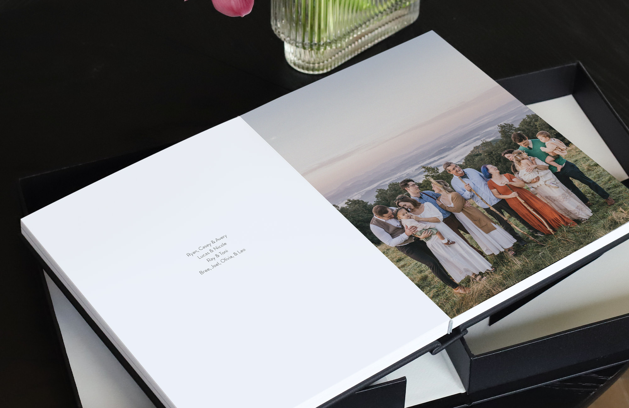 Family Photo Album with photo inside and caption outlining each of their names.
