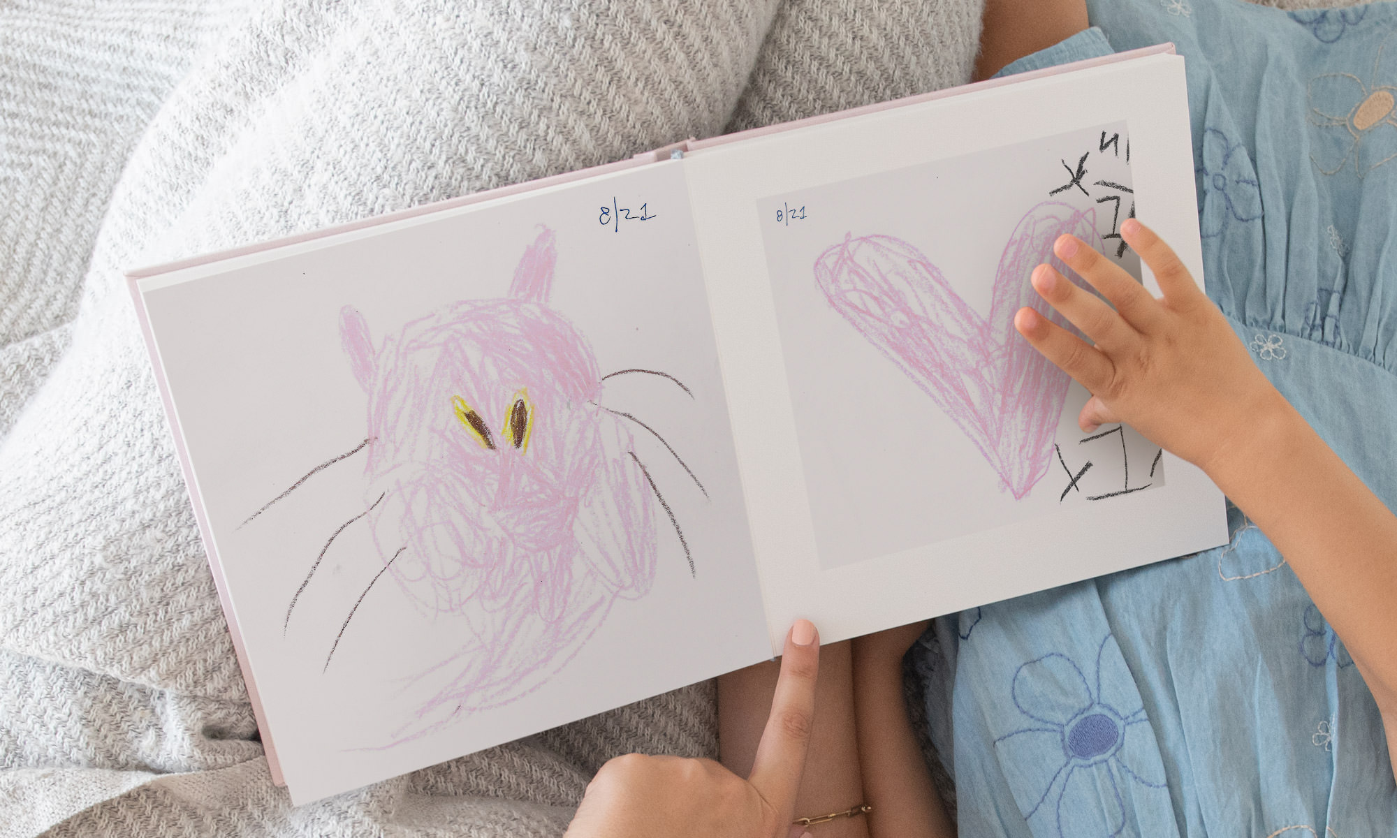 Photo Book with kids art on open spreads