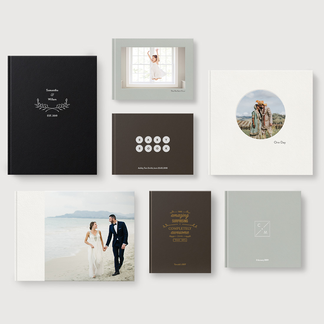 Leather Photo Album designer cover templates laid out across white table