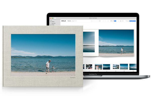 Macbook open to show the Project Extension for Apple Photos. Photo Book showing finished product