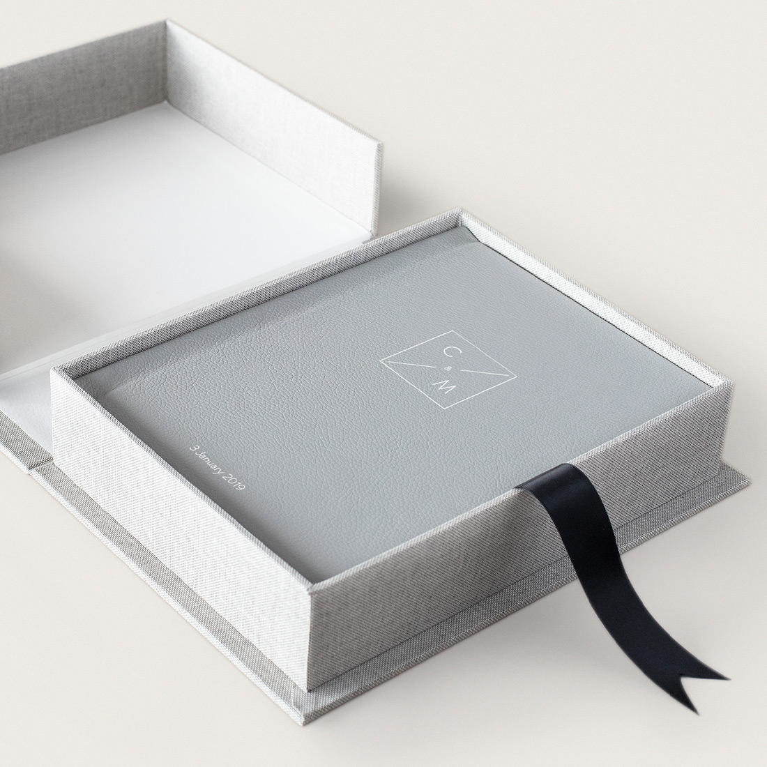 Grey Leather Portrait Photo Album inside grey linen presentation box with black ribbon