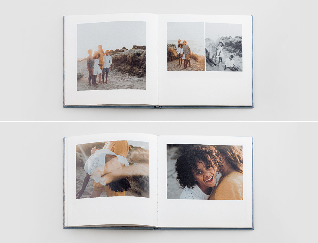 Two open premium photo books showing images of family at beach