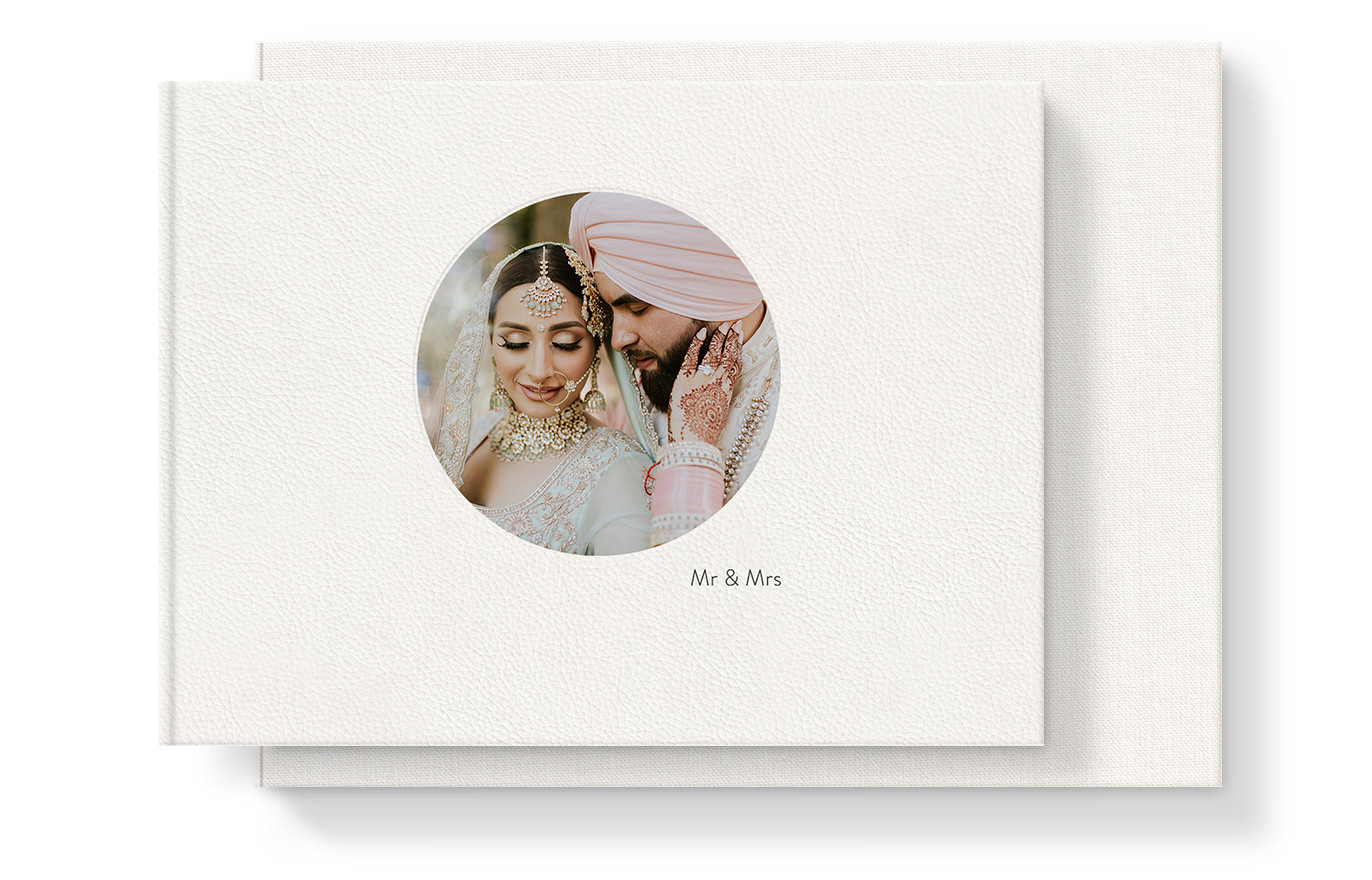 Premium Leather Wedding Photo Album on top of White Milano Leather Presentation Box