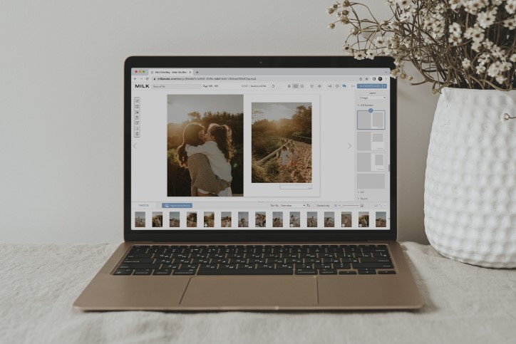 Laptop open with online photo book on screen
