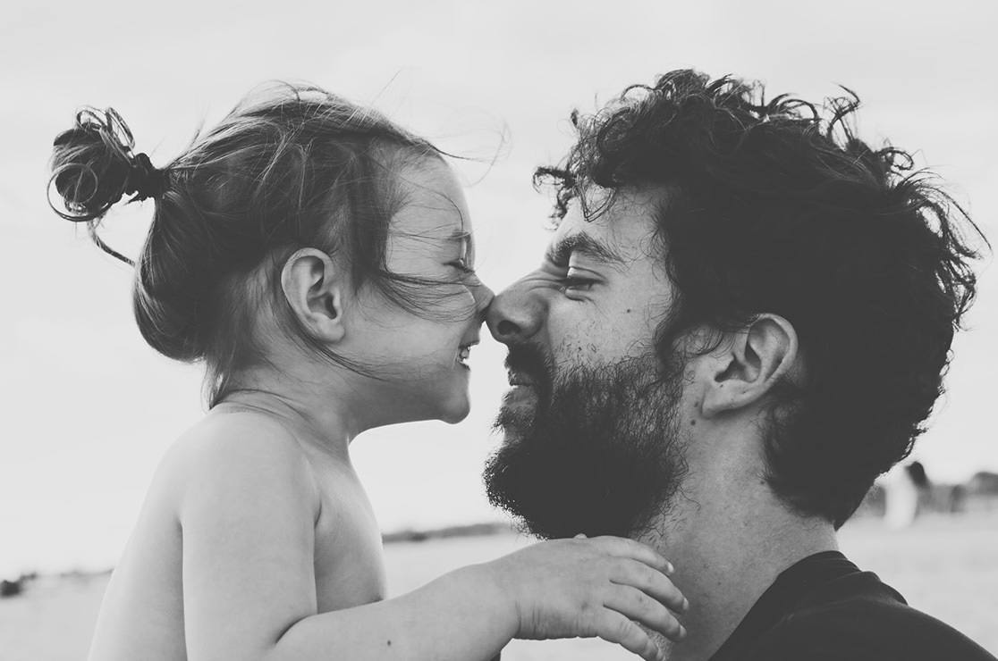father and daughter rubbing noses