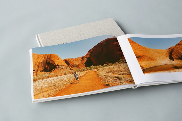 Open Premium Landscape Photo Book with desert path in Australia on pages