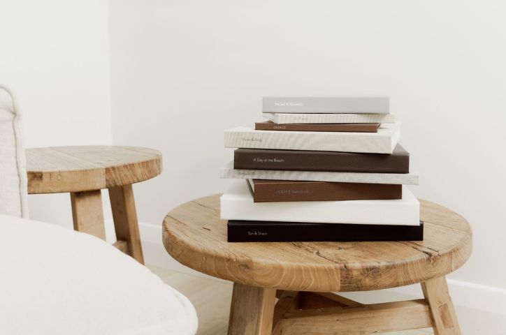 Books stacked up on a chair