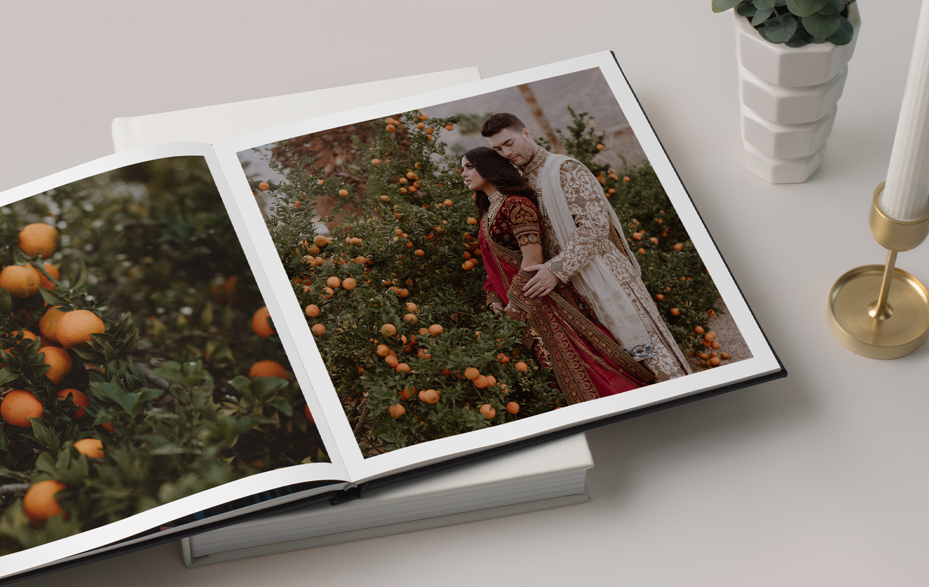 Open Photo Book stacked on a Leather Photo Album