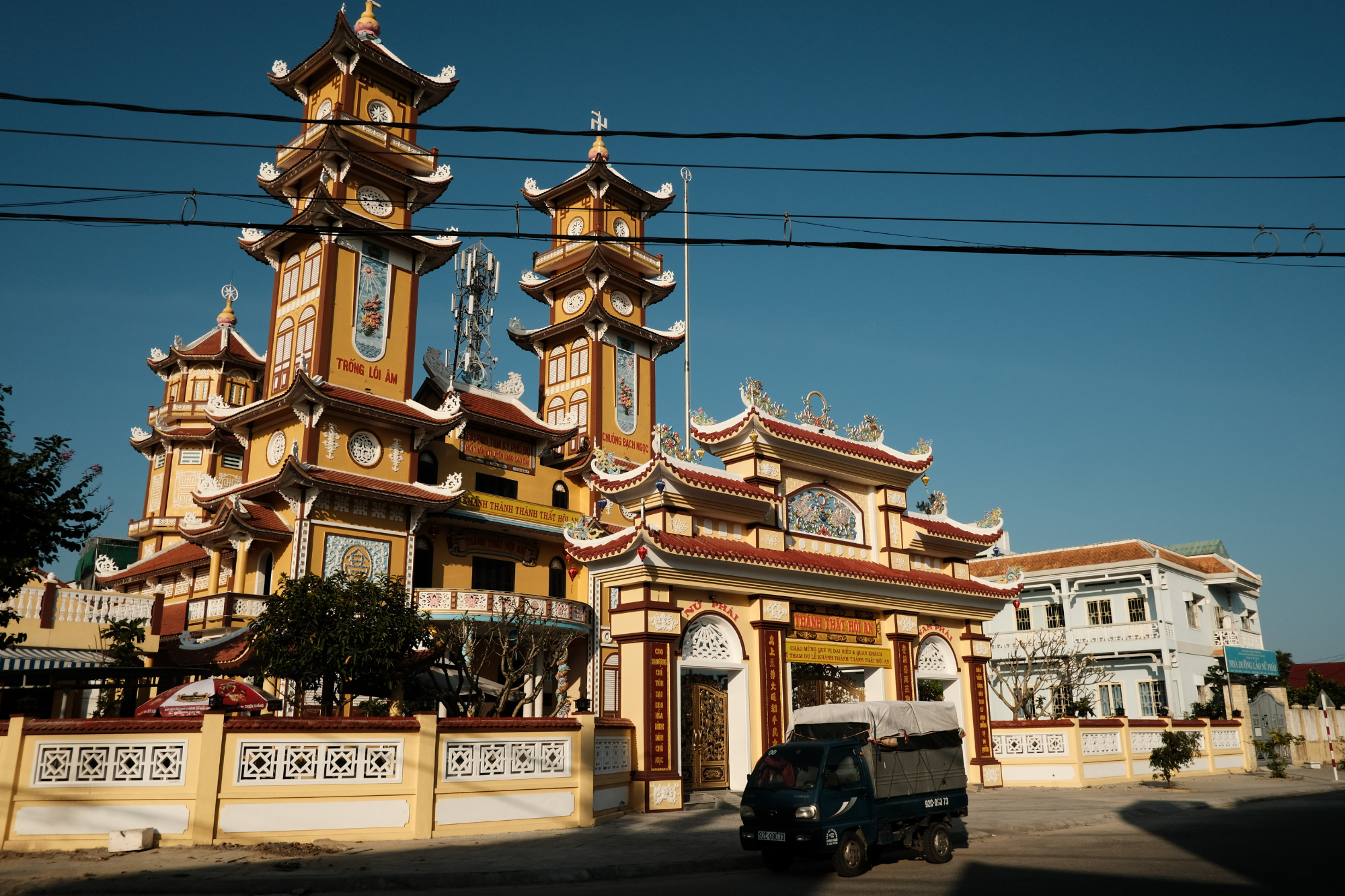 Traditional Vietnamese temple under clear blue sky in Vietnam
