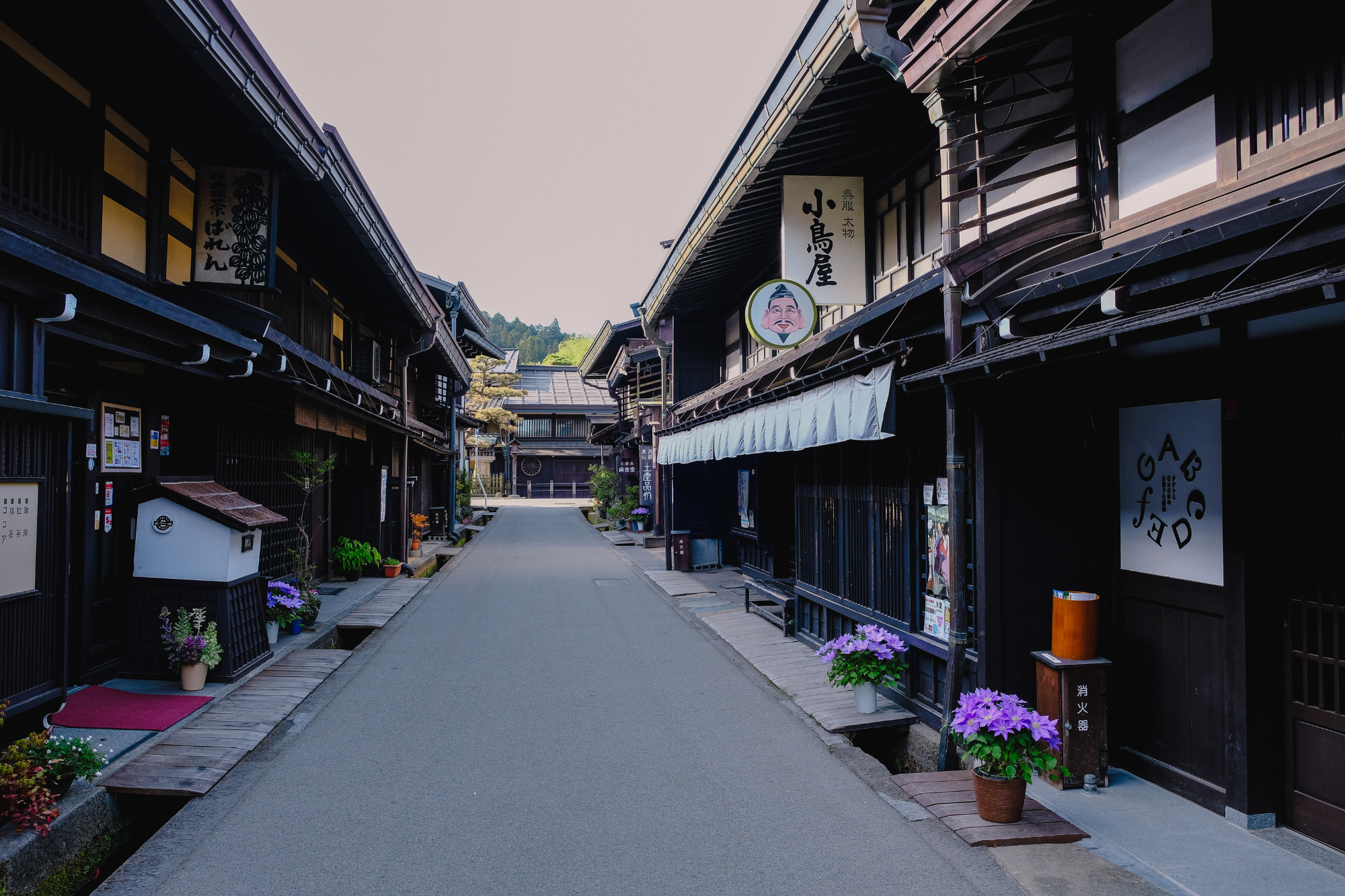 Street view of Takayama Japan with traditional inns and shops on empty street