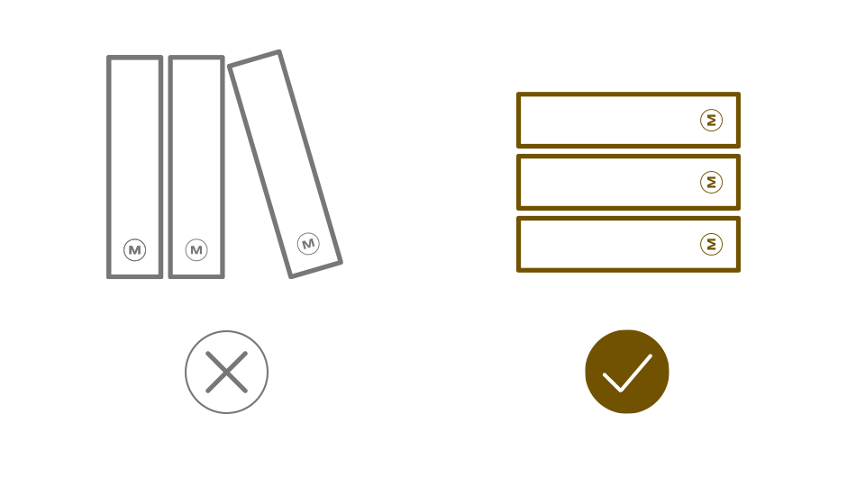 Símbolos para as instruções de cuidado. Coloque os livros de forma plana e não os coloque verticalmente.