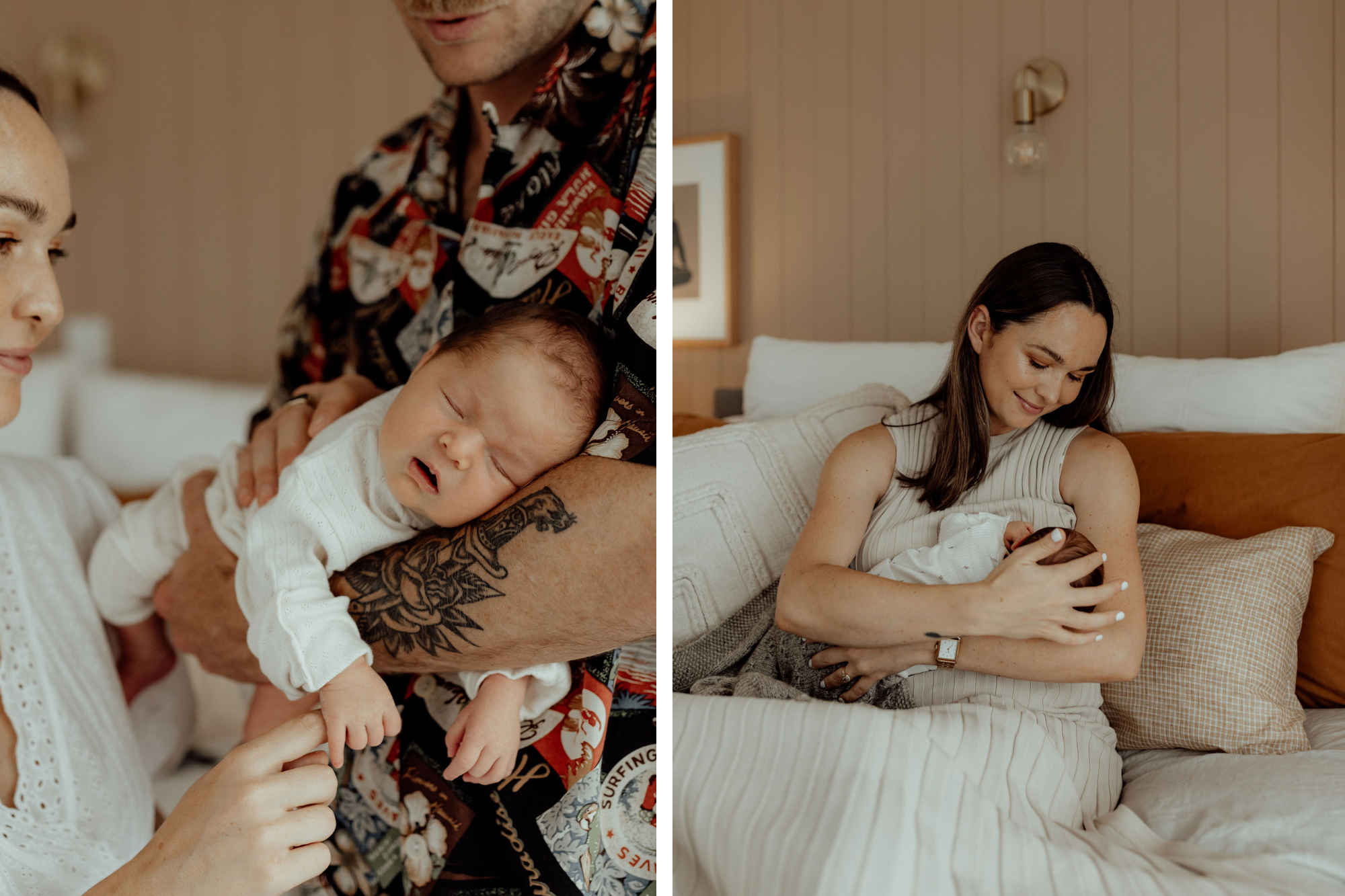 Baby wears white onesie sleeping in parent's arms